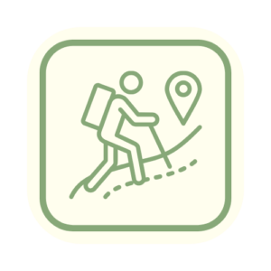 hiker going uphill with a walking stick on a trail map square sign