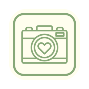 camera with a heart lens icon in a square trail sign icon
